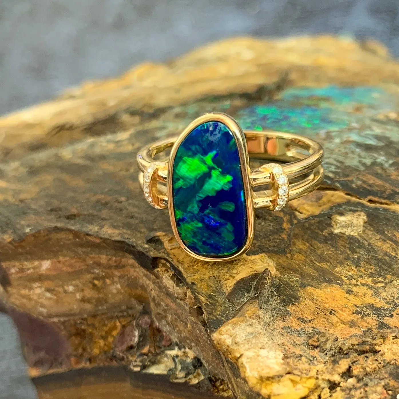 14kt Yellow Gold double row shank with one Opal doublet Blue Green and diamond ring