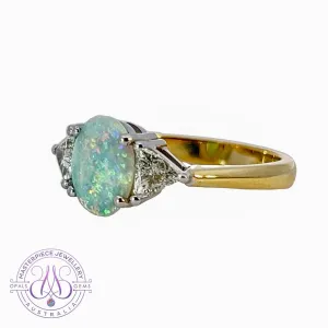 18kt Yellow and White Gold Crystal Opal 1.4ct amd trillion cut diamond ring