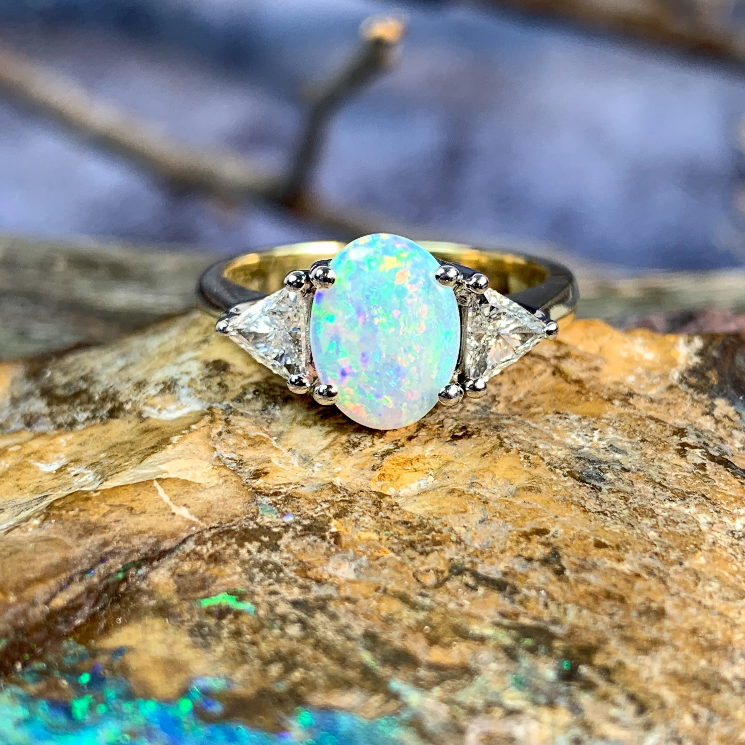 18kt Yellow and White Gold Crystal Opal 1.4ct amd trillion cut diamond ring