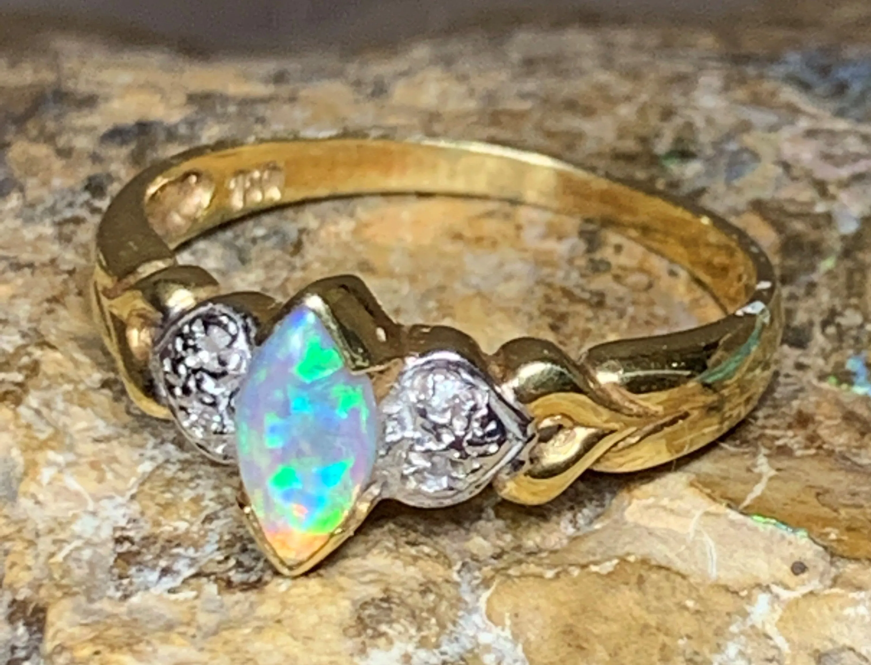 18kt Yellow Gold Black Crystal Opal and Diamond ring