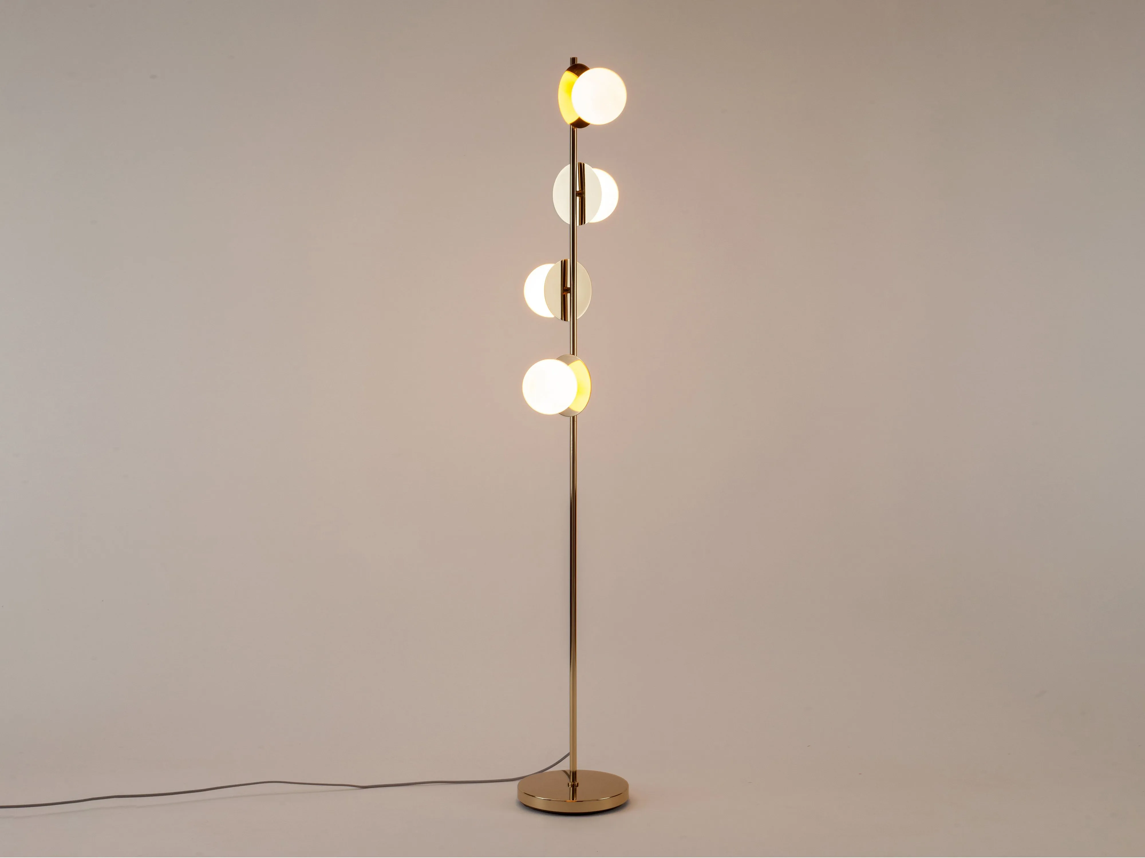 Brass opal disk floor lamp