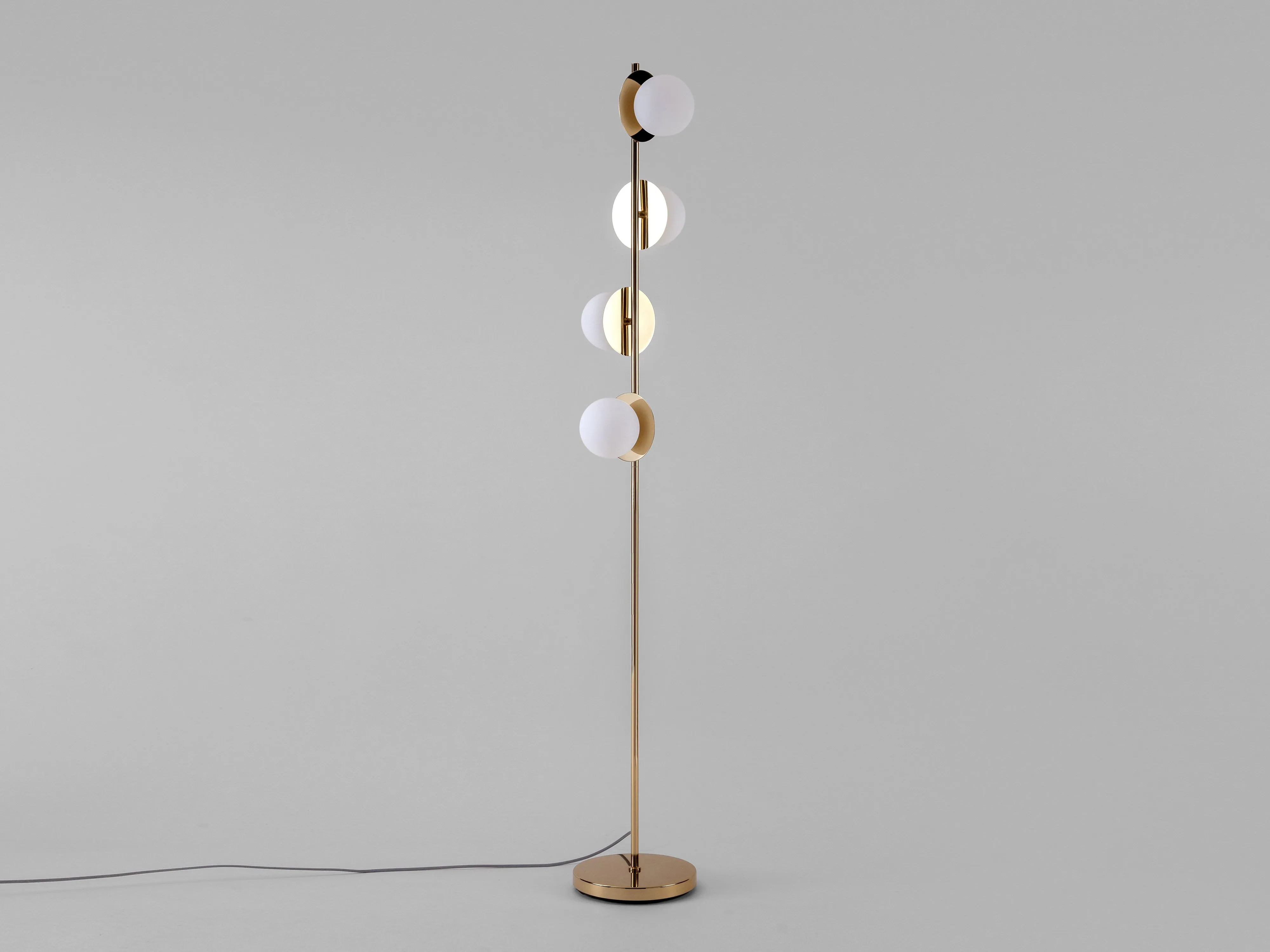 Brass opal disk floor lamp
