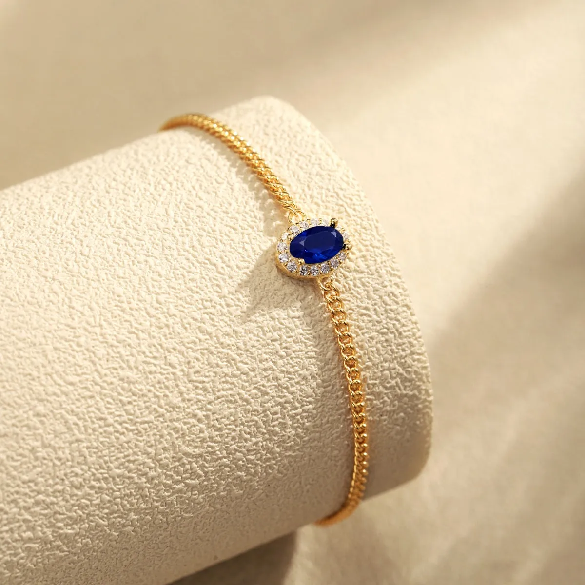 Halo Oval Blue Solitaire Bracelet