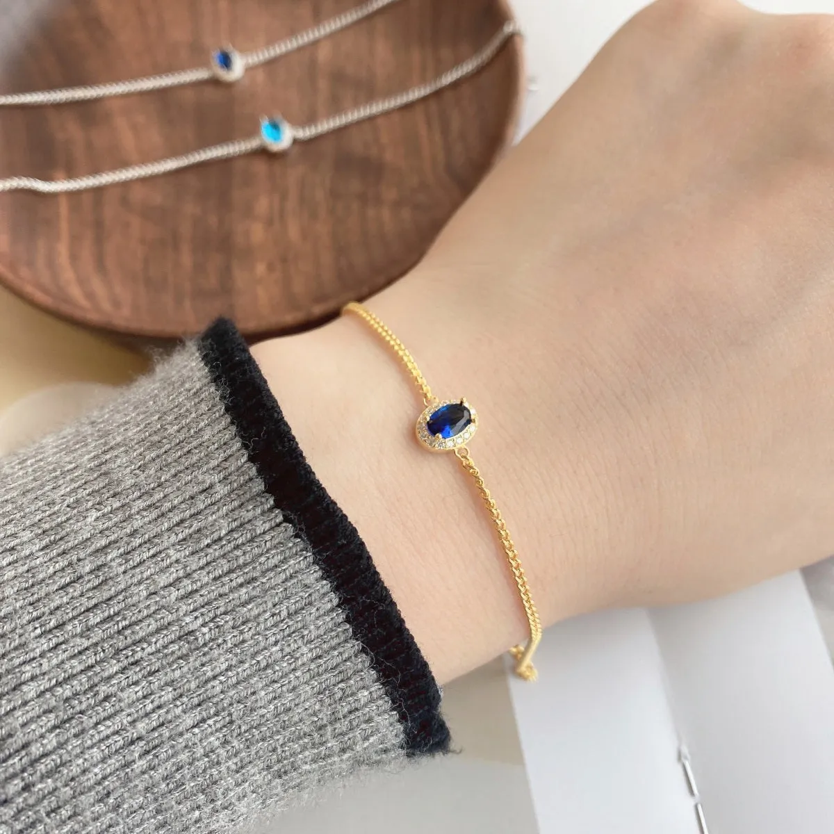 Halo Oval Blue Solitaire Bracelet