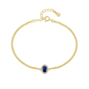 Halo Oval Blue Solitaire Bracelet