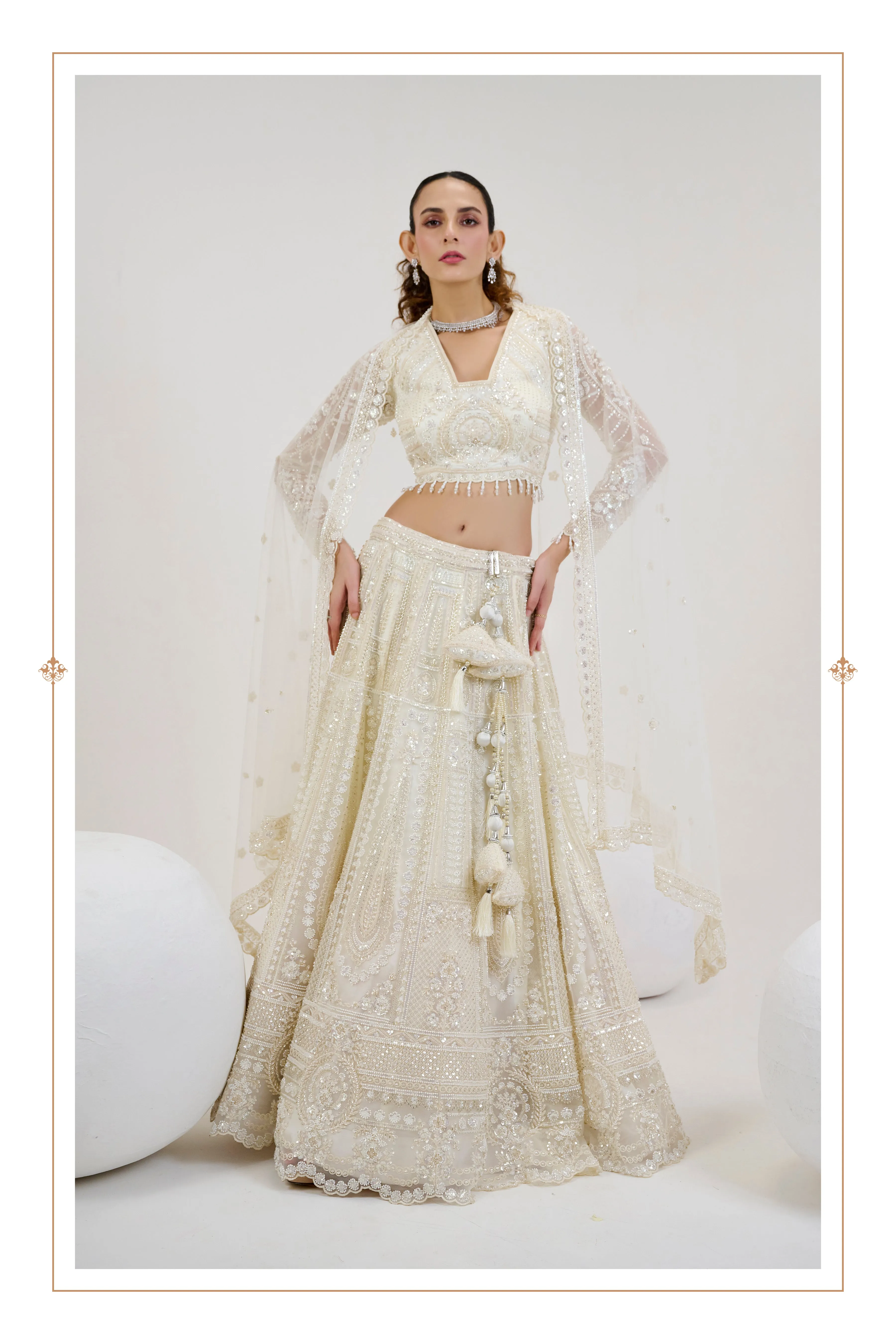 Ivory Net Lehenga with Hand-Embroidered Blouse & Beaded Dupatta
