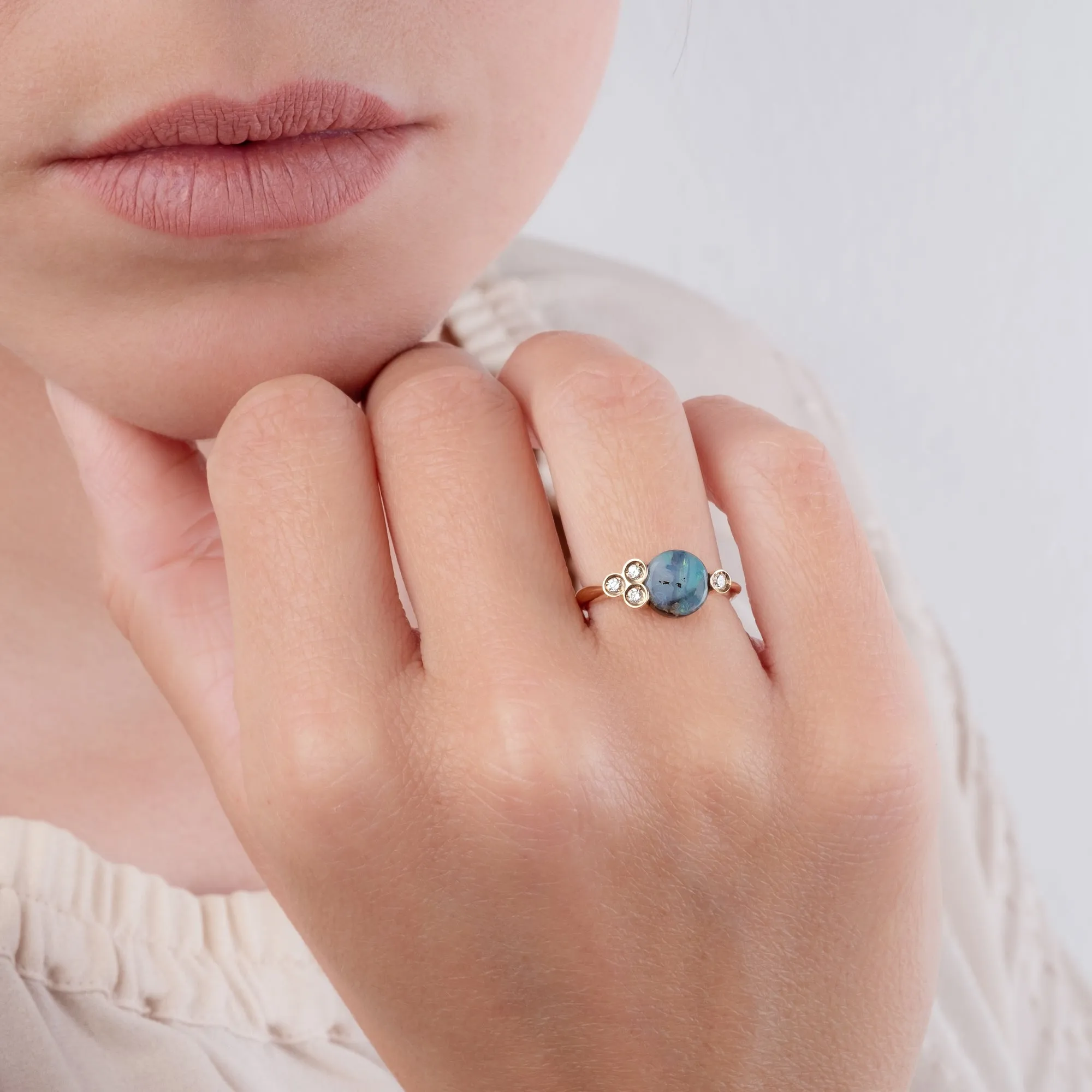 Round-cut Boulder opal 18k rose gold ring